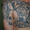 Image : Lion dans la jungle <font size=0.3> ©Jacky tatouage</font>